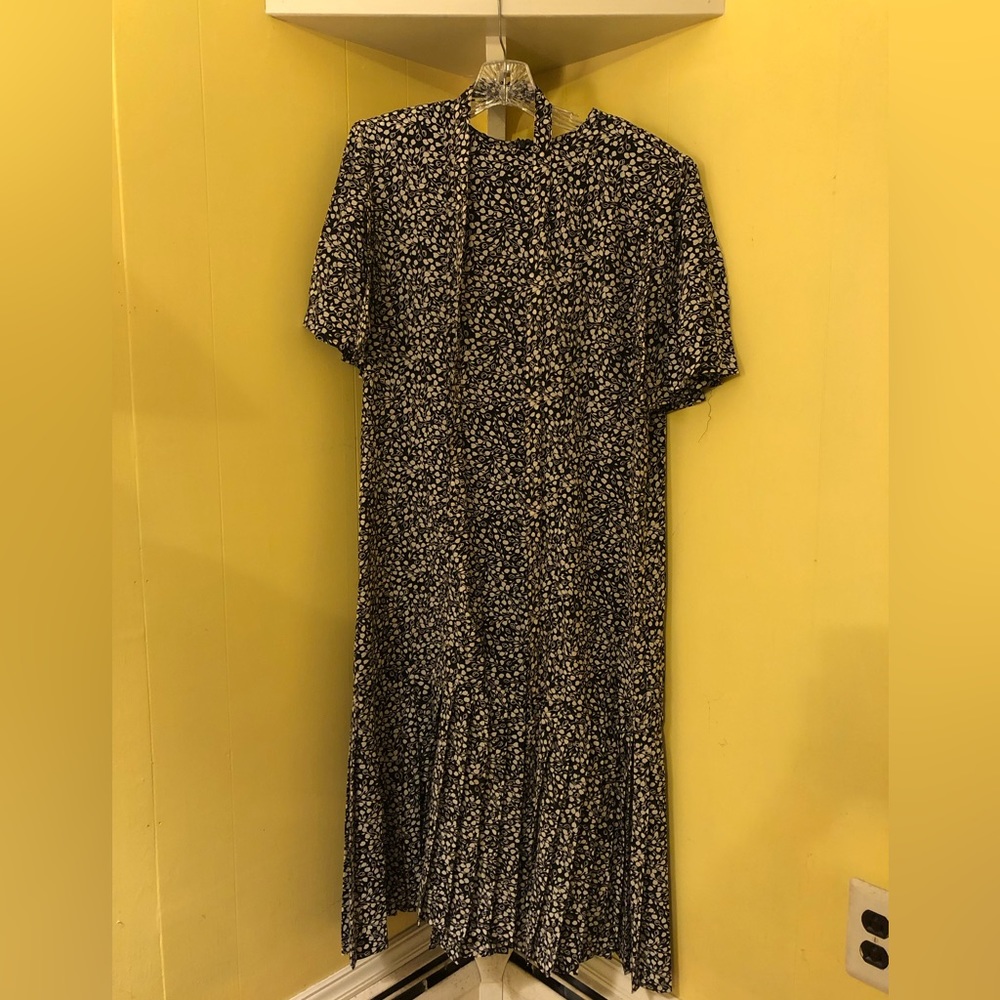 Ciao Ltd dropped waist flapper dress. Pre-owned vintage with belt. Pleated skirt
